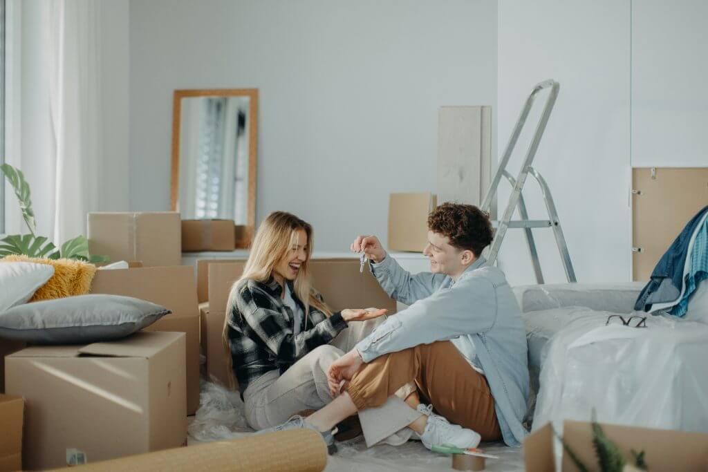 Young couple moving into first home