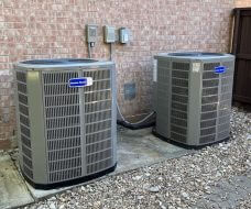 American Standard Platinum 20 Heat Pump installed outside a brick home