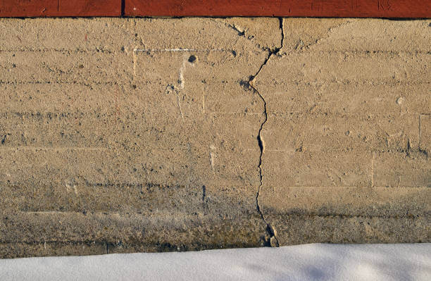 Hairline crack in the foundation of a house