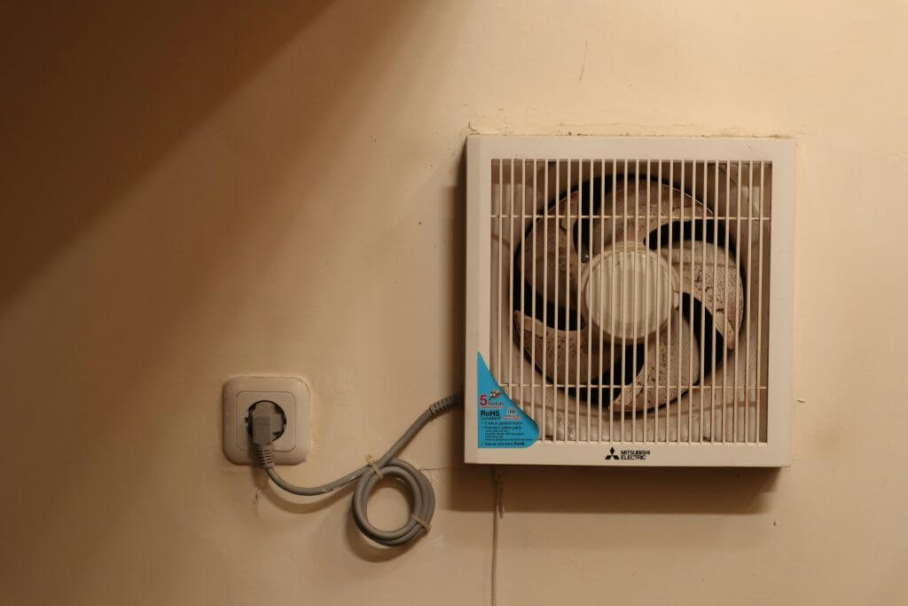 Mitsubishi fan installed on an exterior wall