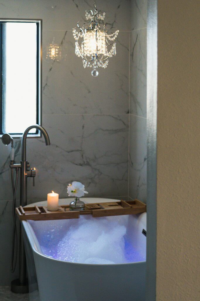 chandelier over bathtub