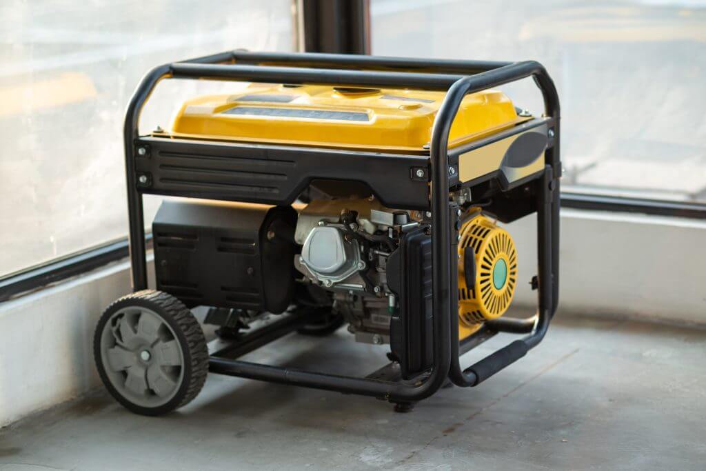 Portable electric generator running in the cold winter.