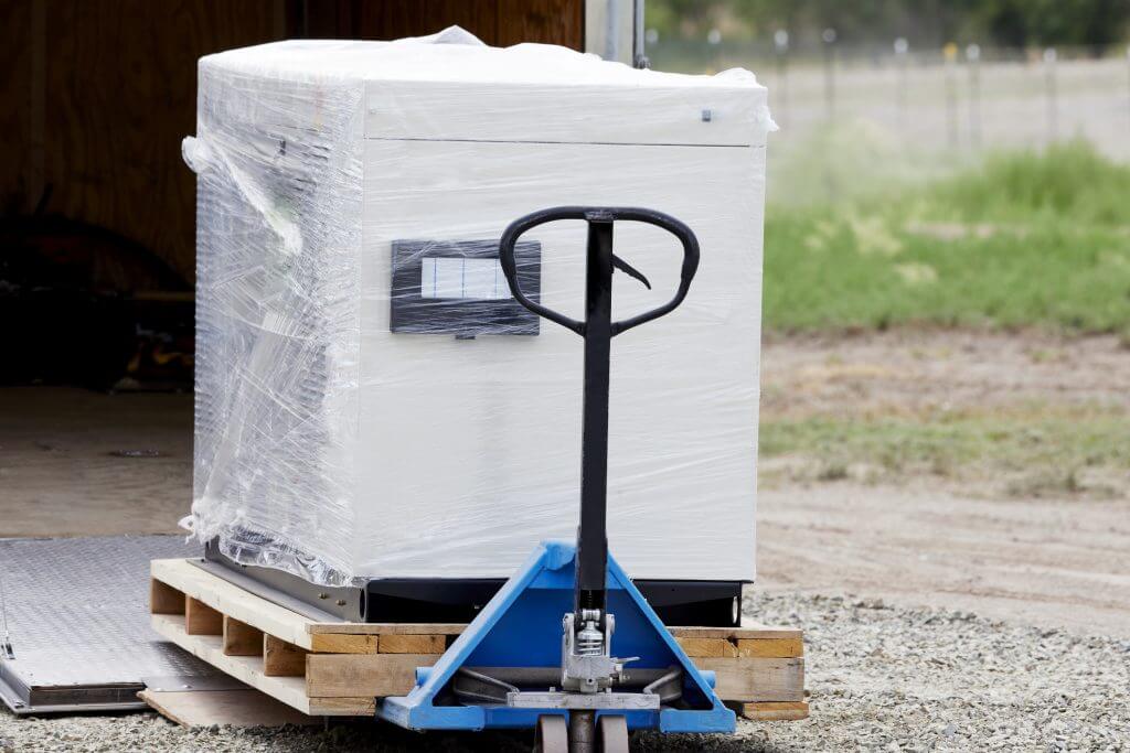 New home back up generator being unloaded