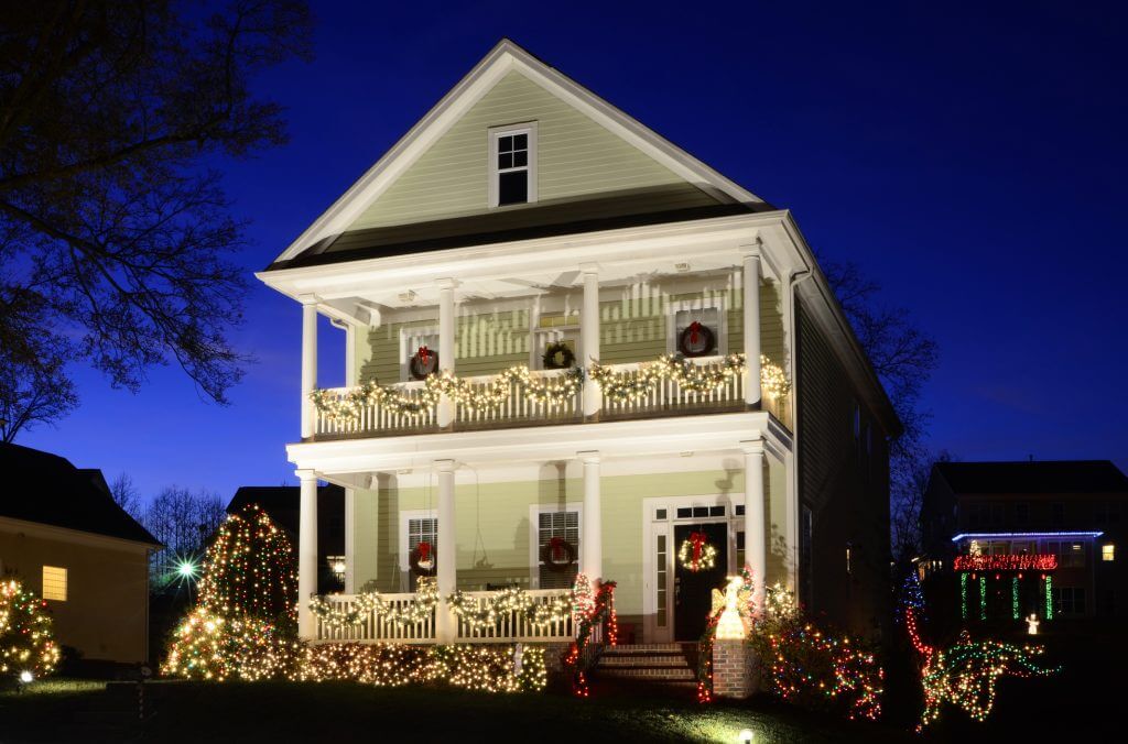 This traditional wood-siding home is beautifully and tastefully decorated for the Holiday Season. 