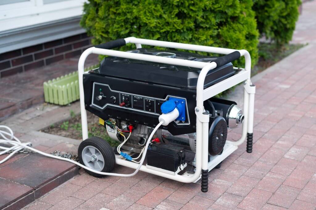Power supply generator placed on street sidewalk. outdoor diesel power generator in Ukraine.