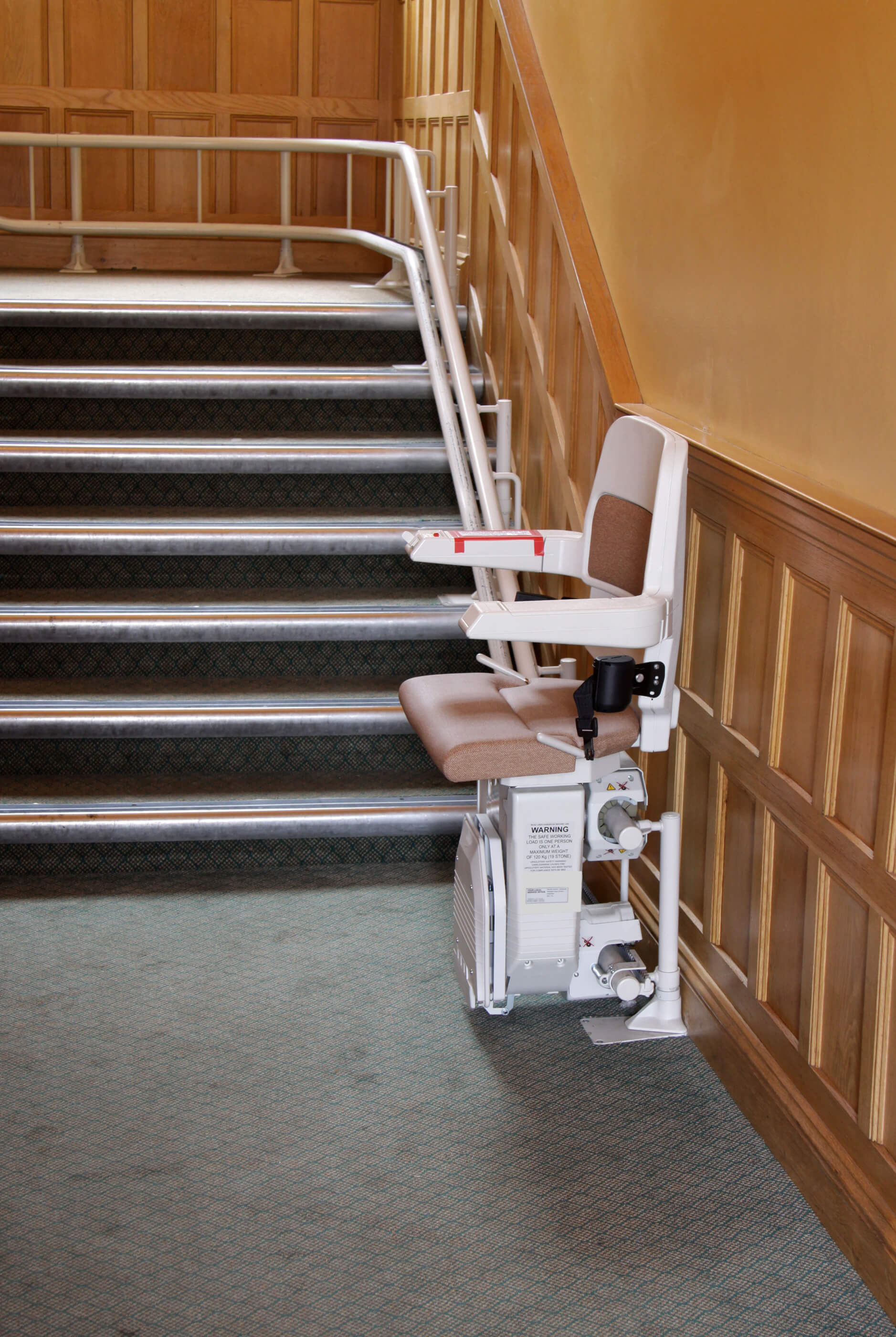 Stairlift installed on a curved staircase