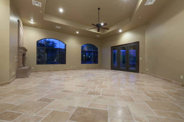 Tan ceramic tile flooring in an open room