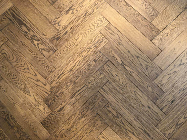 hardwood floor installed in a herringbone pattern