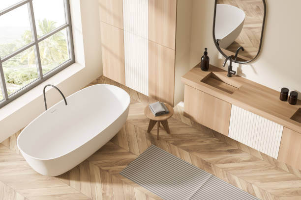 Bathroom with light LVP floors in a herringbone pattern
