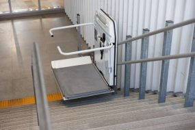 A stairlift with a platform for a wheelchair