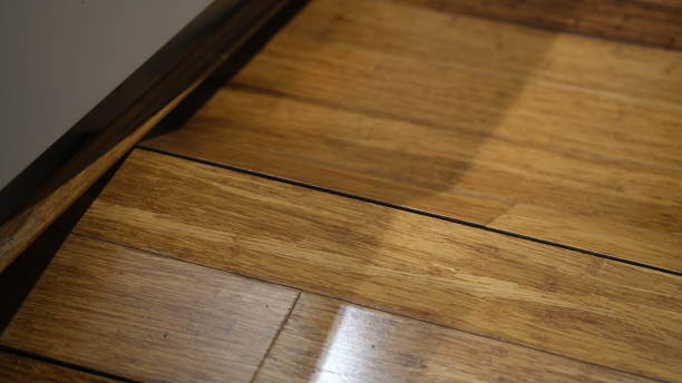 Wooden or bamboo floor buckling due to water damage