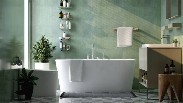 Modern and luxury design bathroom with bathtub, toilet bowl, vanity, washbasin, shelf and towel rail in sunlight from window on green granite wall and tile floor  for cleaning, toiletries product display background